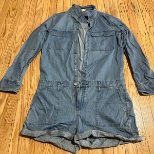 Paige chambray romper. Long sleeves. Button/zipper closure. Front/back pockets.